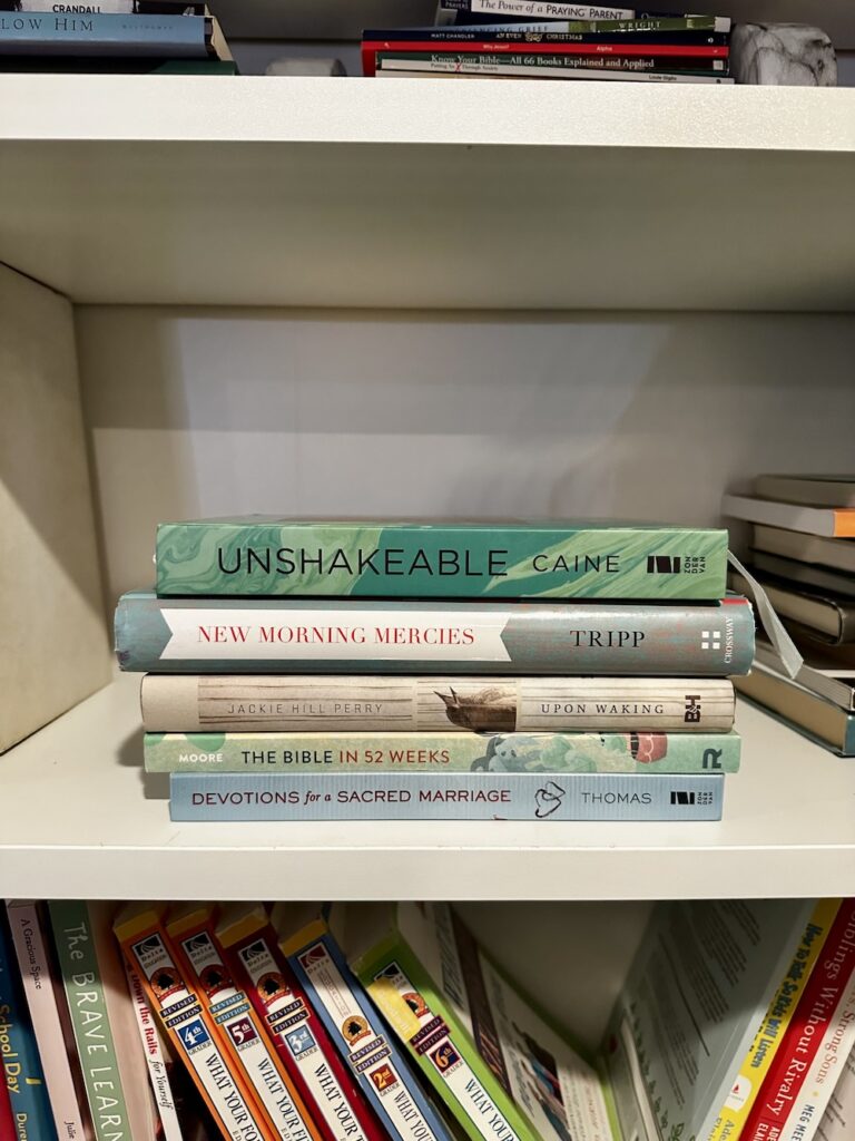 stack of books on a bookshelf